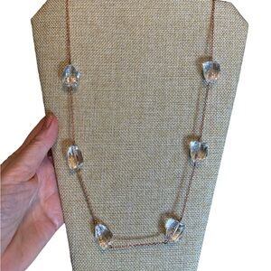 Rose gold or bright copper tone necklace with large crystal like beads.